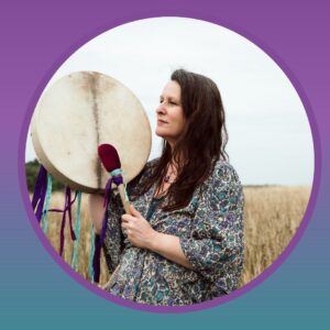 close up of sophie drumming in field